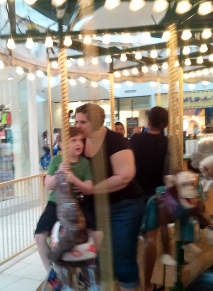 Riding the Carousel - Ava Love Hanna